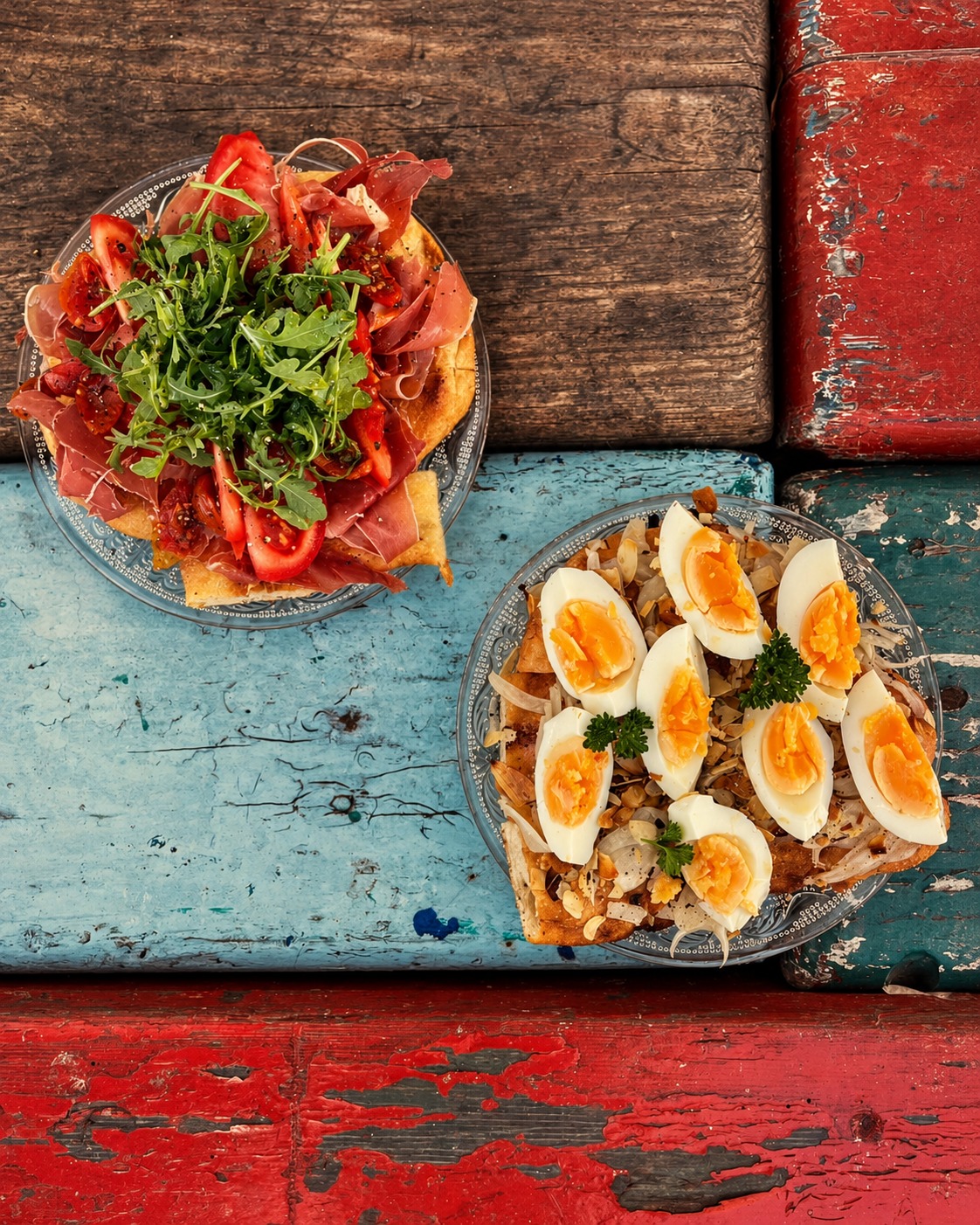 Small plates on a painted wooden table